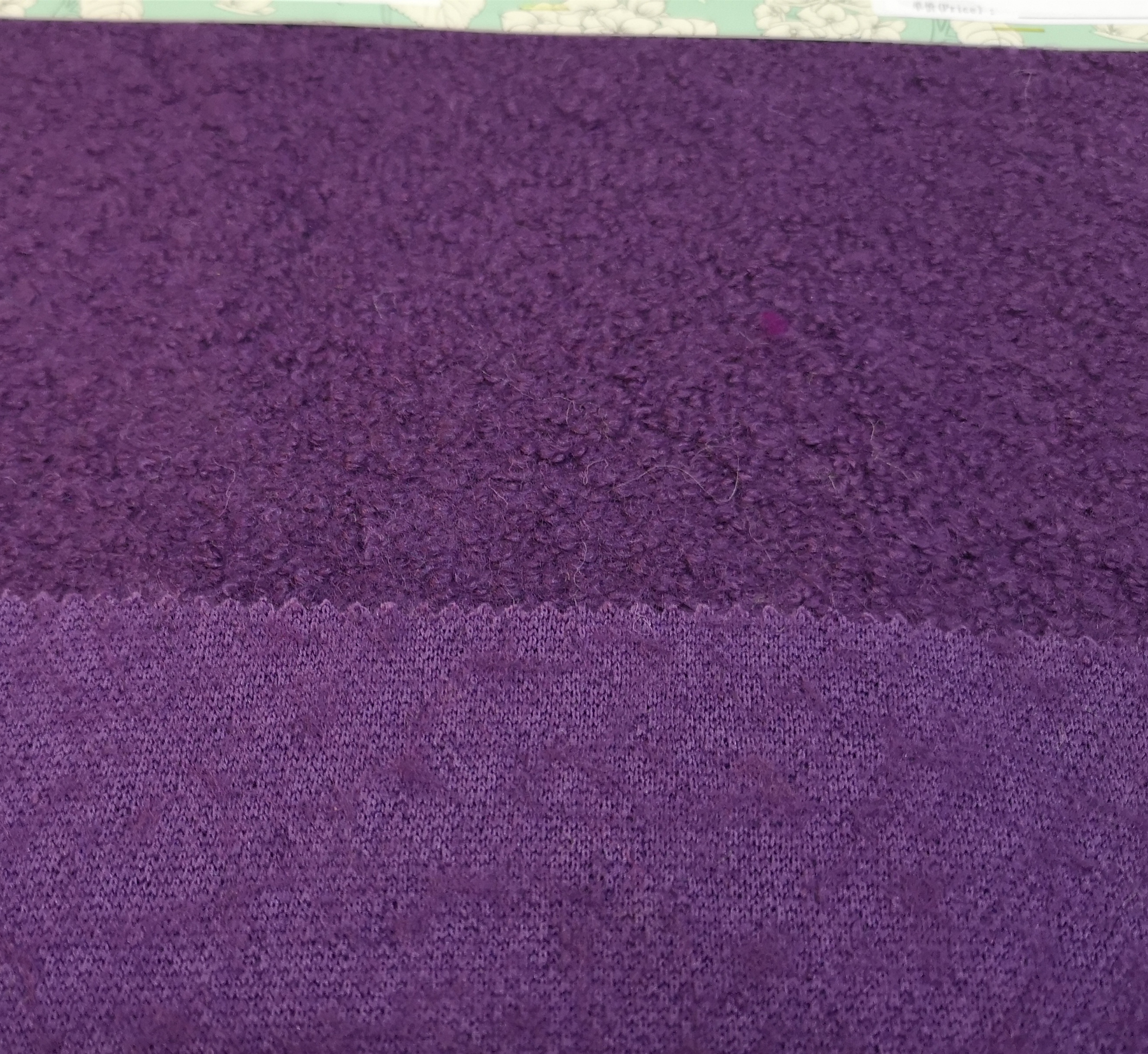 Knitted wool viscose polyester blend boucle fabric
