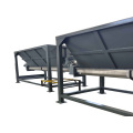 Intermediate buffer silo for the building materials industry