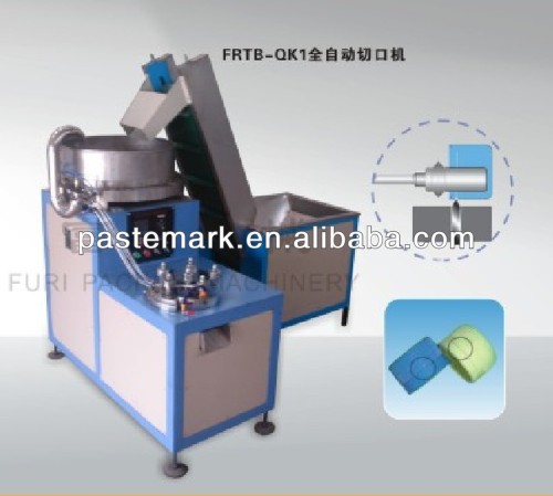 Bottle cap/cover slotting machine