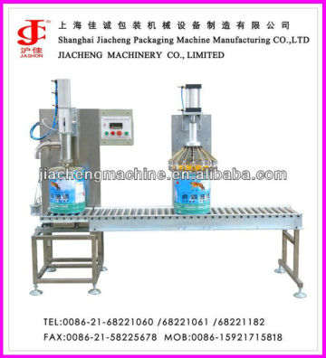 Semi-auto lube oil filling and capping machine