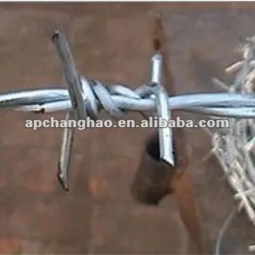 barbed wire in grass boundary