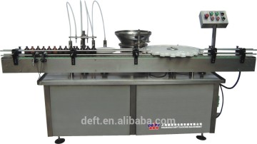 Linear volumetric type bottle filling and capping machine