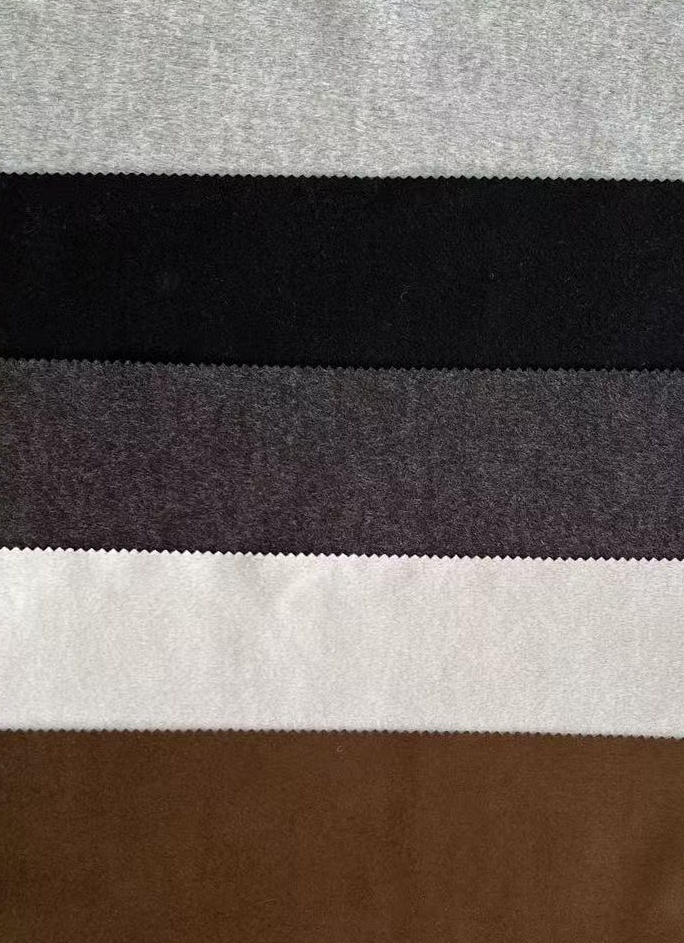 Knitted polyester viscose needle punched double face fabric