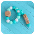 Anillo de madera Silicone Triple Baby Teether Toys