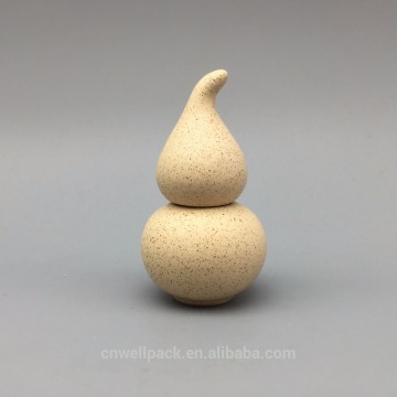 Different sizes colorful ceramic jars for cosmetic products