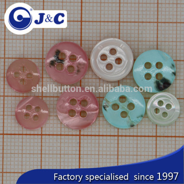 bottom with spray painting trocas shell buttons