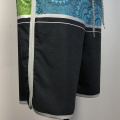 Blue and black patterned boardshorts