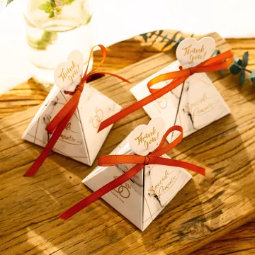 Small triangular paper candy box