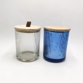 Mercury color inside ribbed glass candle jar with wood lid