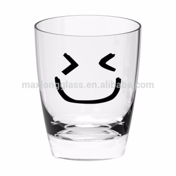 Machine made glass cup with smile face