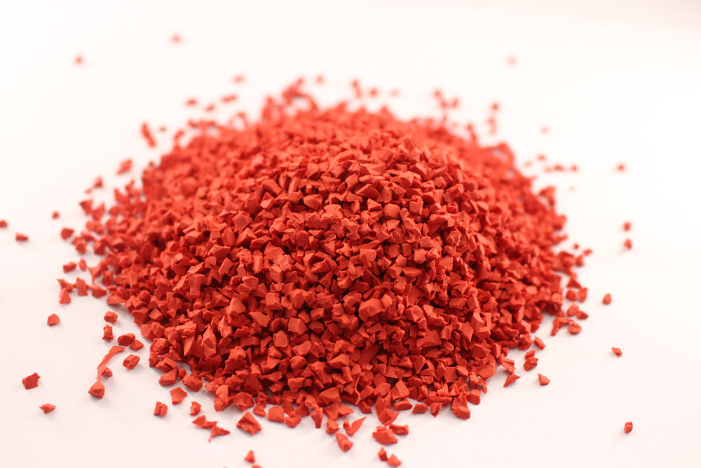 Partículas de caucho rojo Red rubber particles
