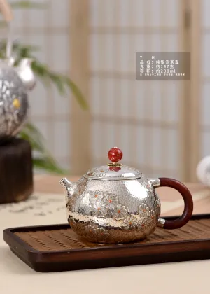 Handcrafted Silver Teapot with Delicate Daisy Hammer Design