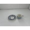 ceramic coffee cup with tray