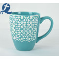 Promotional price travel souvenir ceramic relief mug