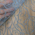 Tessuto per abiti in tulle glitterato in poliestere corallo alberi