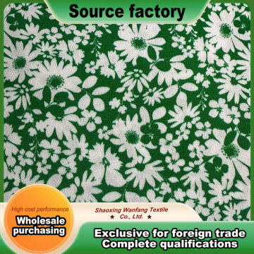 Green fabric with small floral prints