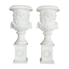 Elegant White Urns with Floral Relief Square Bases