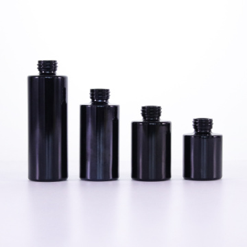 Черная цилиндрическая стеклянная бутылка для эфирного масла