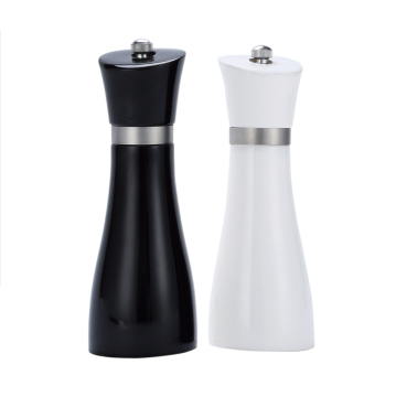Wooden pepper mill with metal ring