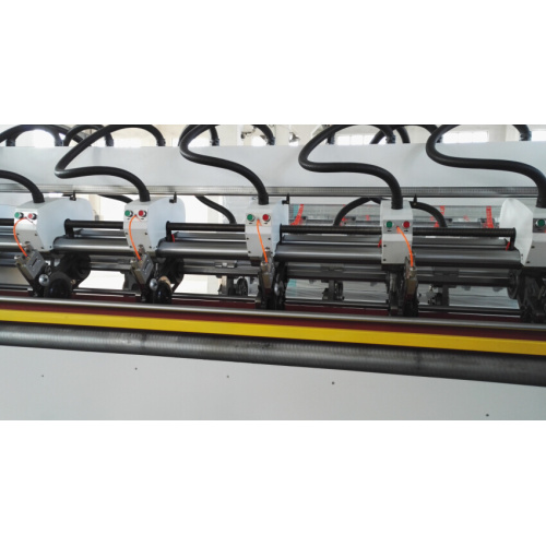 Automatic electric adjustment slitter scorer machine