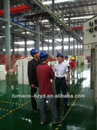 Copper/bronze foundry workshop installing melting furnace