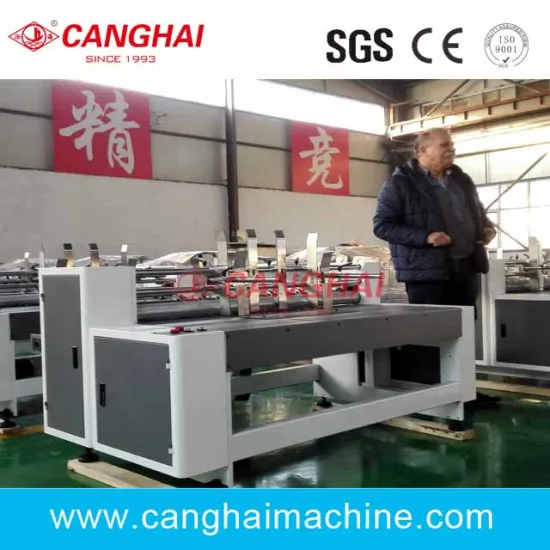 Automatic paper partition slotting machine