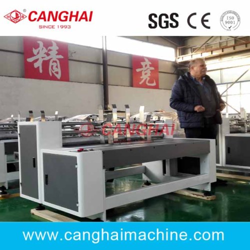 Automatic paper partition slotting machine