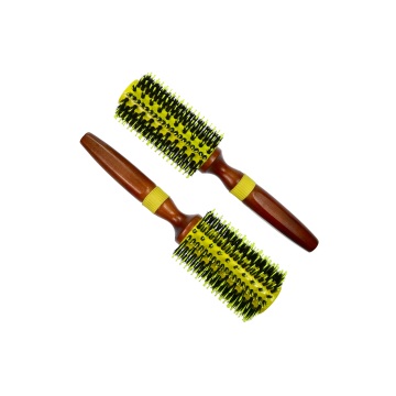 Деревянная круглая щетка ручной работы для укладки и ухода за волосами.