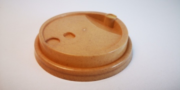 Fully degradable disposable cup lid made of sugarcane