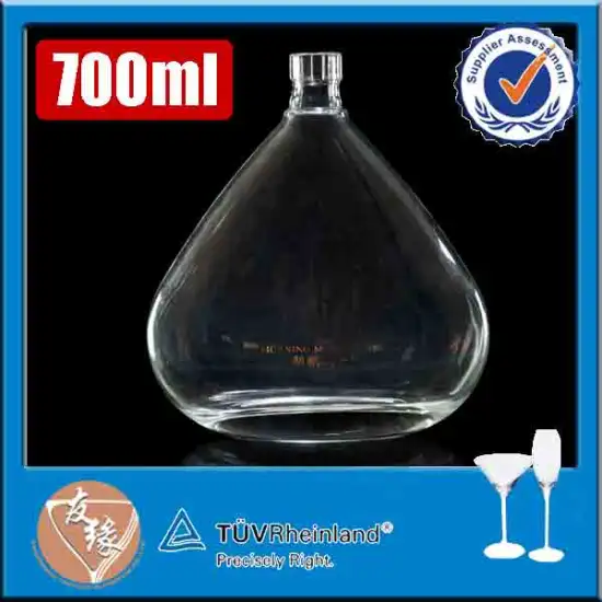 Wholesale special shaped high white glass 700ml spirit bottle