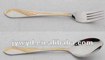 stainless steel spoon and fork set with gold