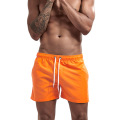 Shorts esportivos masculinos de laranja personalizados