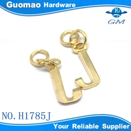 small light gold metal letter J ornament