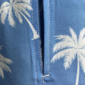 sky blue pineapple-patterned beach shorts