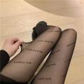 Black B-letter jumpsuit stockings