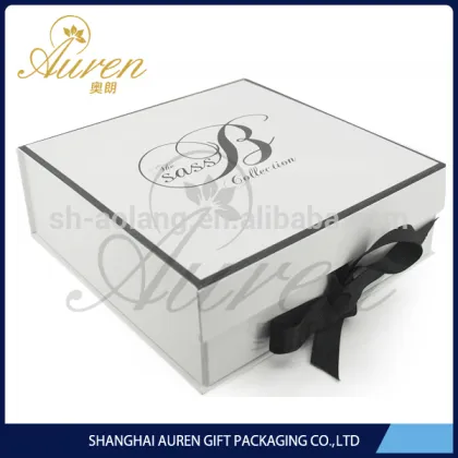 Plain white folding apparel boxes with ribbon