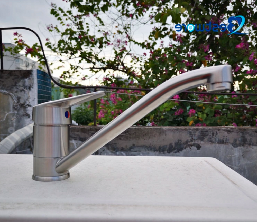 Stainless Steel Faucet On Kitchen Sink