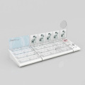 Acrylic counter display stands design for cosmetic products