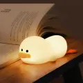 La luz nocturna encantadora en forma de pato mejora el espacio del sueño de los niños