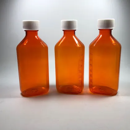 Wholesale PET Plastic Cough Syrup Bottles: 2oz & 4oz Oval Medicine Containers for Pharmacy Use