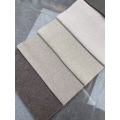 Tissu d'ameublement chenille de couleur unie aspect lin
