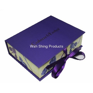 Purple flip gift box with purple bow