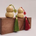 Butelka na kółkach z naturalnej bambusowej tykwy
