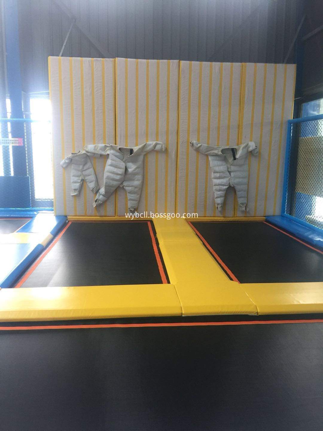 indoor trampoline park with spider wall