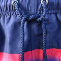 Men's dark blue strappy board loose shorts