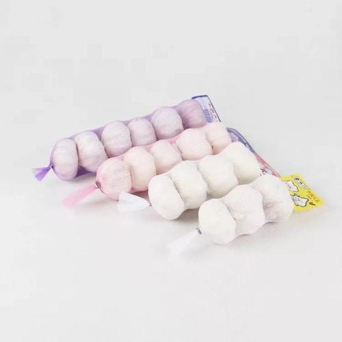 white plastic tubular mesh bag for garlic