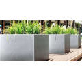 Decorative tapered stainless steel planter with mirror face