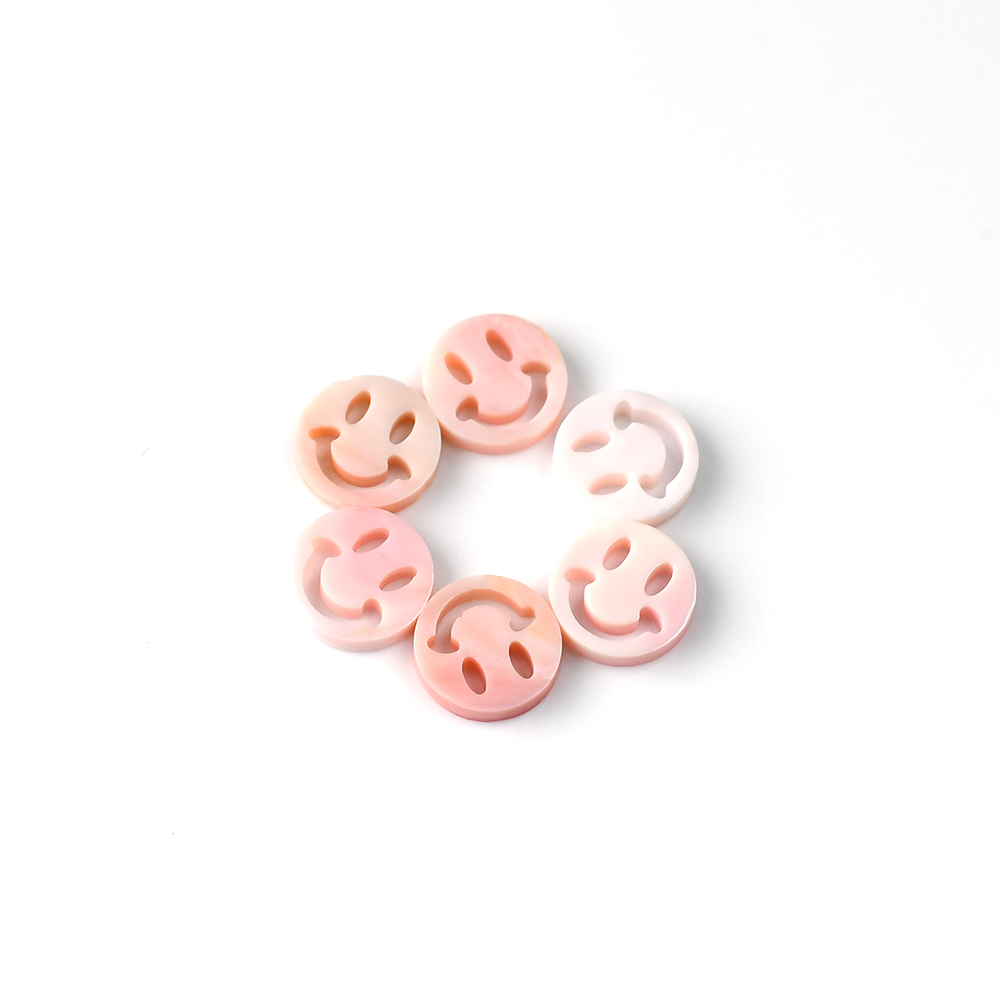 Pink mother-of-pearl sculptured shape