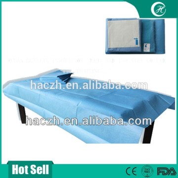 blue hospital treatment table disposable sheet
