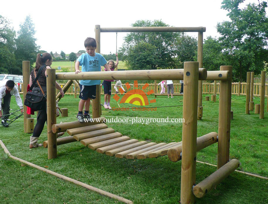 wooden balancing bridge playground